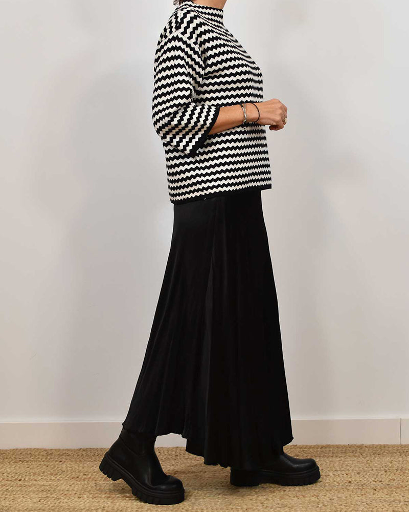 Topp med bølgestriper