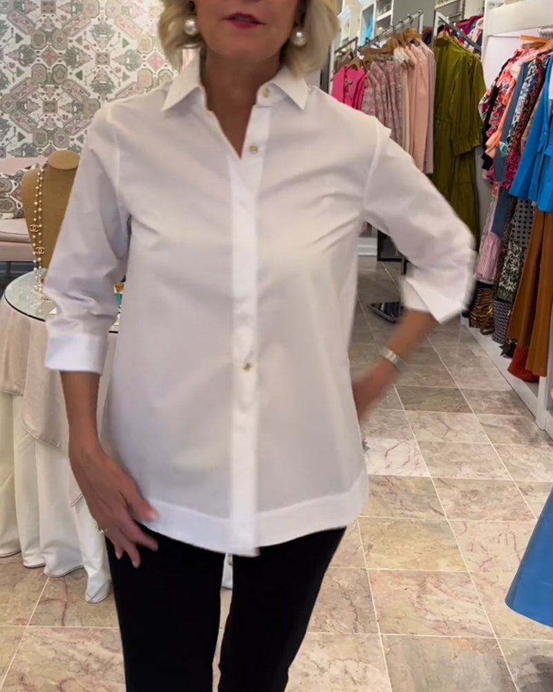 Ensfarget bluse med glidelås