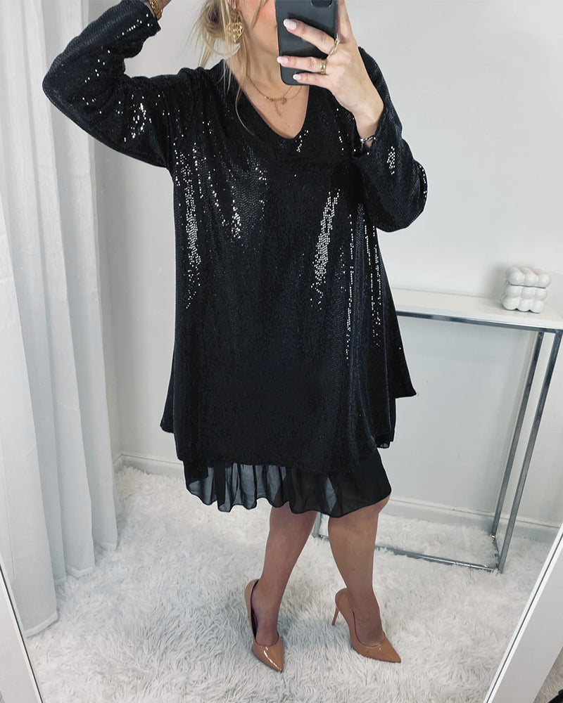 Elegant løs kjole med lang erm