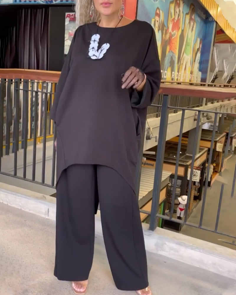 Topp med løs passform og lange ermer