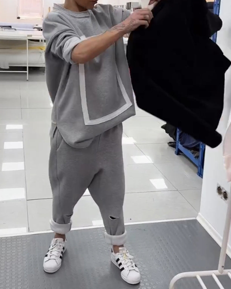 Enkel ensfarget hettegenser