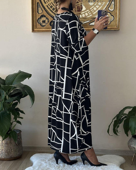 Løs shiftkjole med lomme og rund hals