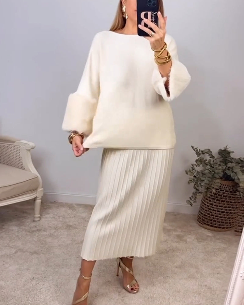 Elegant ensfarget genser med lange ermer