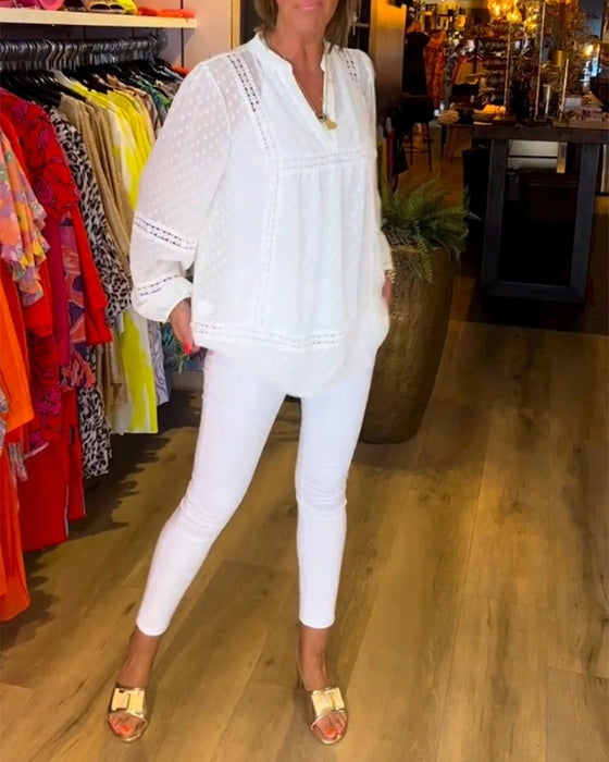 Langermet topp i blondepanel med V-hals