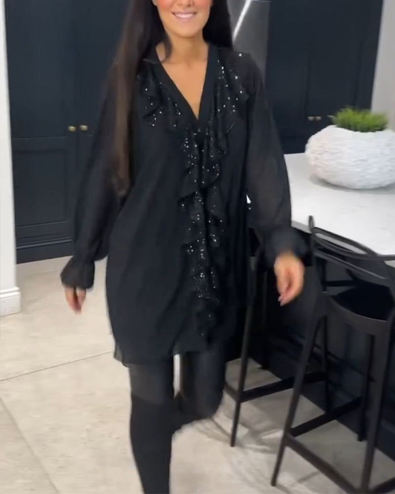 Bluse med volanger og elegant stil