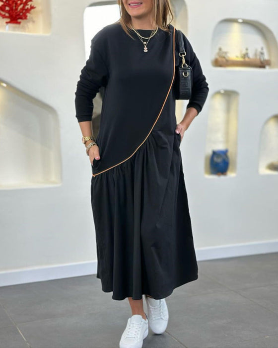 Skiftkjole med lomme og lange ermer