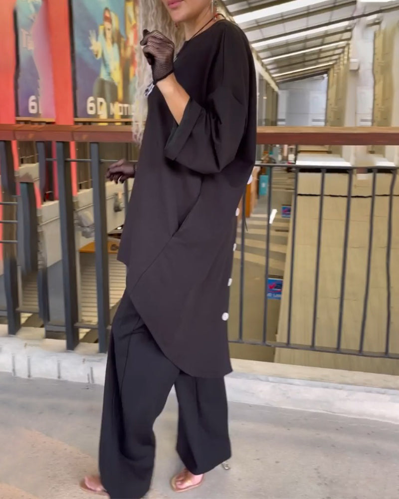 Topp med løs passform og lange ermer