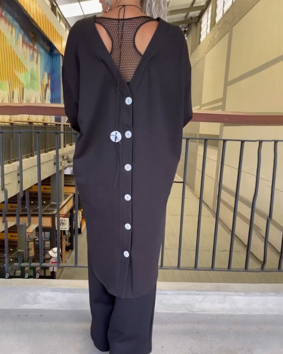 Topp med løs passform og lange ermer