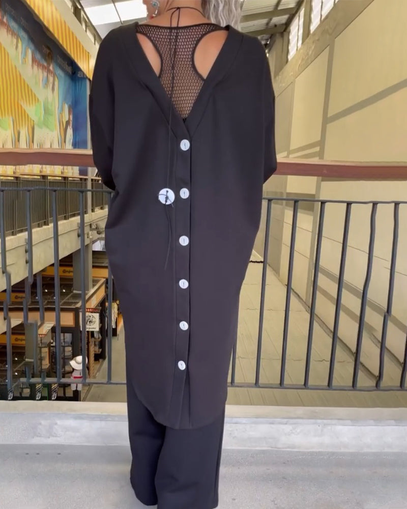 Topp med løs passform og lange ermer