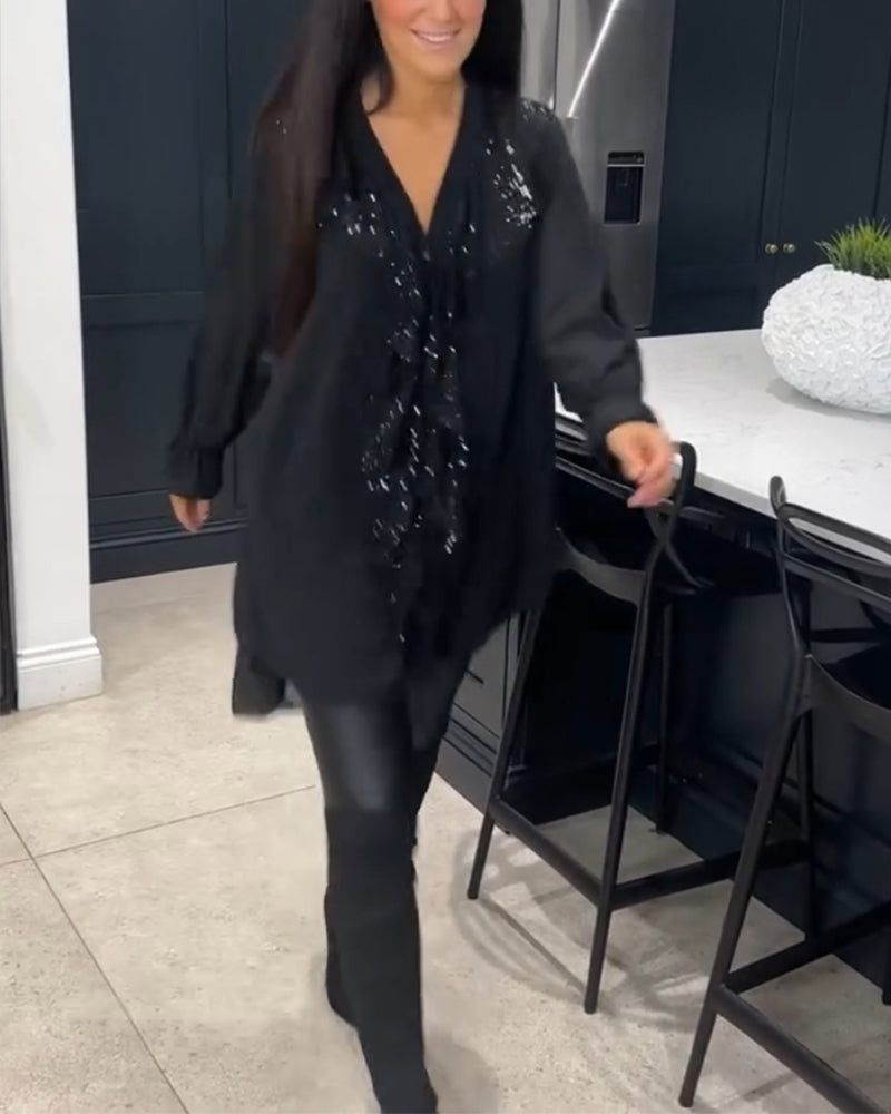 Bluse med volanger og elegant stil