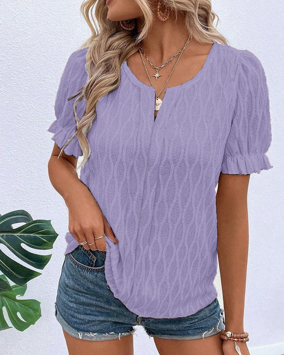 V-hals puffermet ensfarget topp