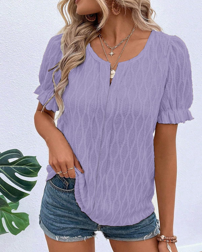 V-hals puffermet ensfarget topp