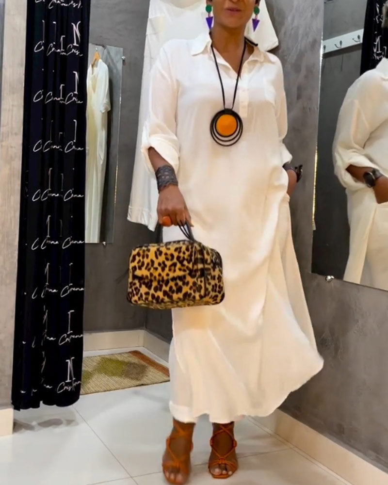 Fastfarge kjole med jakkeslag og lomme