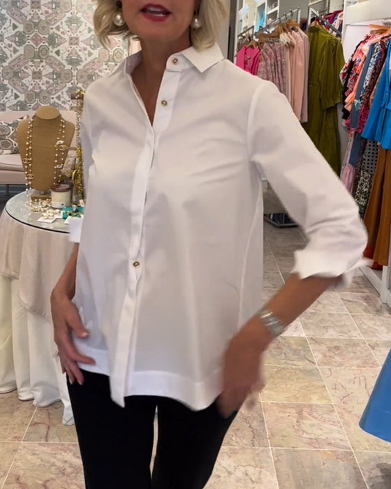 Ensfarget bluse med glidelås