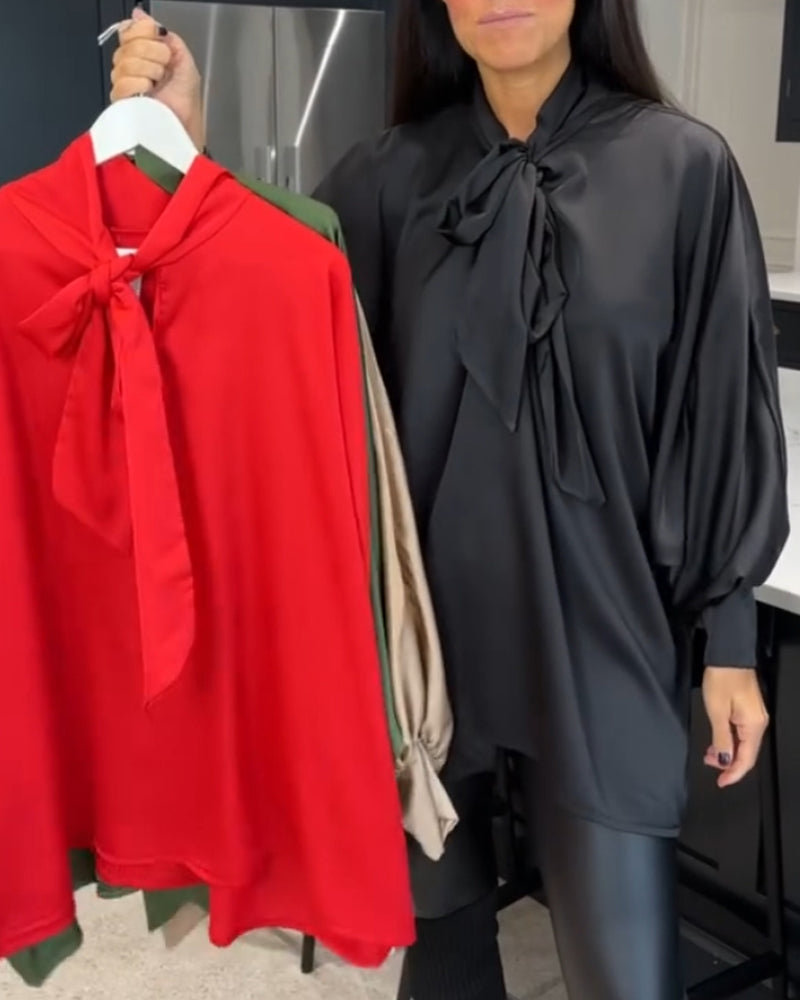 Båndkrage ensfarget og elegant bluse