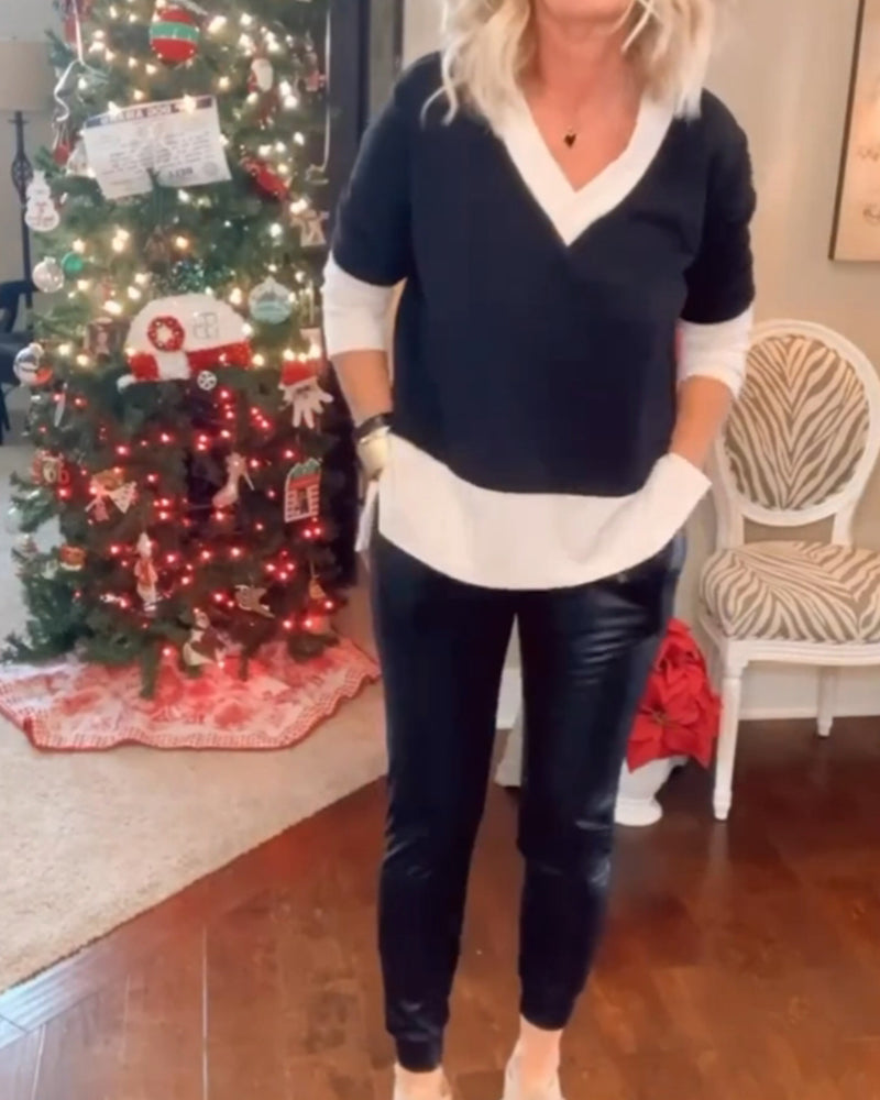 Avslappet topp i fargeblokk v-hals